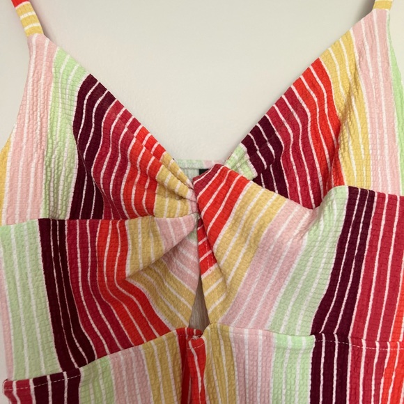 Comfy stretchy short romper. Colorful and fun. Slight cut out on the front. - Picture 3 of 4